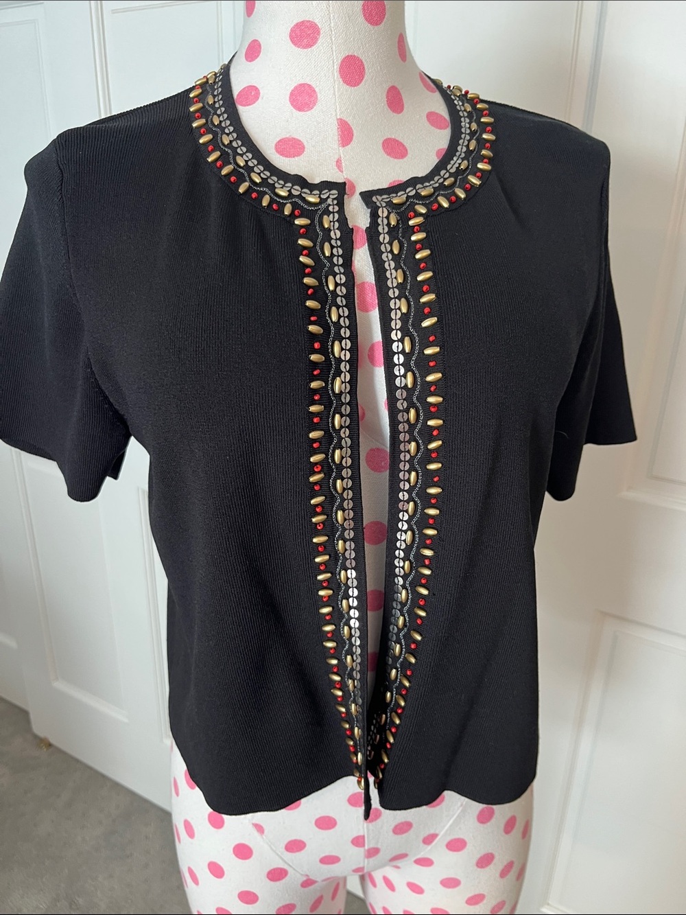 Grace Black Short-Sleeve Knit Top with Decorative Stitching